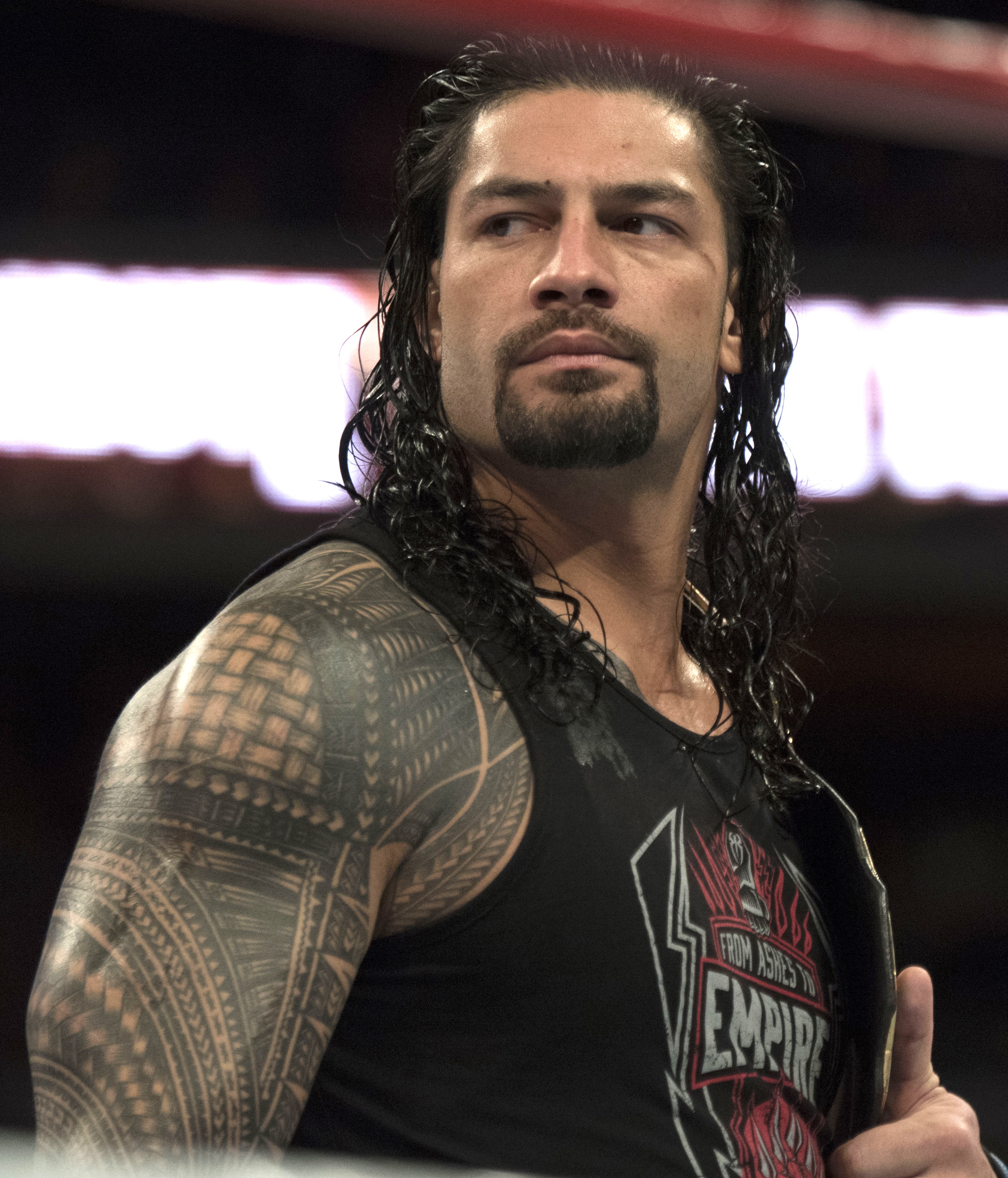 dwayne johnson cousin roman reigns